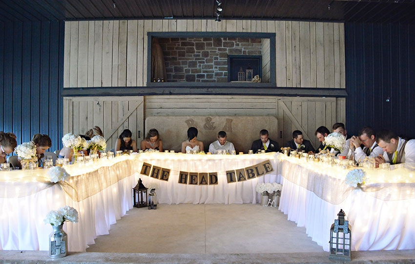 bridal party head table at Seven T Farms St louis area wedding venue in Sullivan Missouri